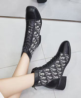 Botas gruesas de piel sintética negra con cordones para mujer